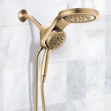 Click here to see Delta 58680-CZ-PR25 Delta Universal Showering HydroRain Two-In-One Shower Head, 5-Setting, H2Okinetic, MagnaTite, 2.5 GPM, Lumicoat Champagne Bronze - 58680-CZ-PR25