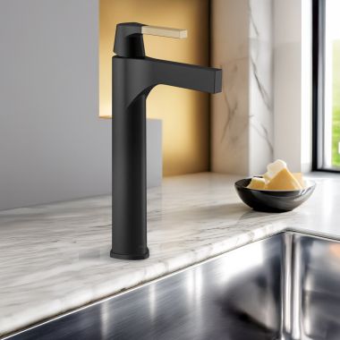 Click here to see Delta 774-GZ-DST Delta Zura Single Handle Vessel Bathroom Faucet, DIAMOND Seal, ADA, 1.2 GPM, Matte Black/Champagne Bronze - 774-GZ-DST