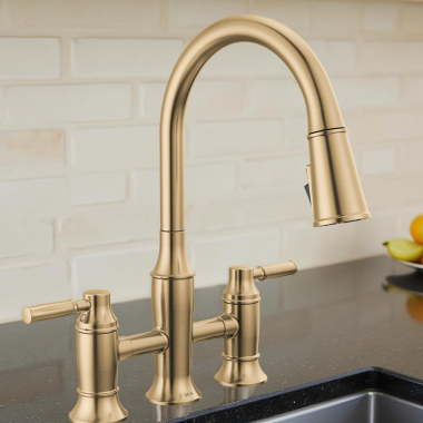 Click here to see   Delta Renaldi Two Handle Pull-Down Bridge Kitchen Faucet, 1.8 GPM, Lumicoat Champagne Bronze - 2384L-CZ-PR-DST