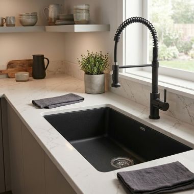 Click here to see Blanco 442930 Blanco Precis 27” Single Bowl Undermount Kitchen Sink, with Rear Center Drain, Coral Black - 442930
