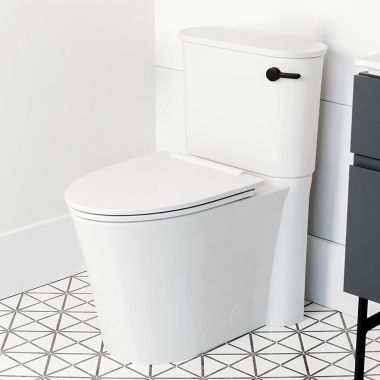 Click here to see American Standard 226AA105.020 American Standard Studio S Elongated Two-Piece Toilet, Right Height, Right-Hand Trip Lever, 1.28 GPF, White - 226AA105.020