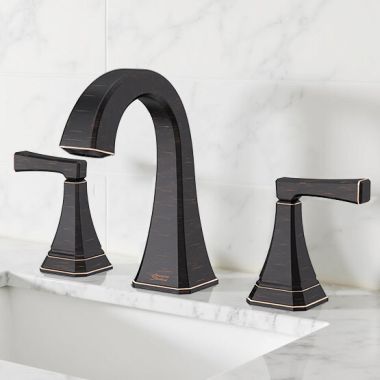 Click here to see American Standard 7612807.278 American Standard Crawford Widespread Bathroom Faucet with Metal Push Pop-Up, Two Handles, ADA, WaterSense, 1.2 GPM, Legacy Bronze - 7612807.278