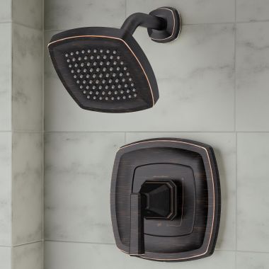 Click here to see American Standard TU612501.278 American Standard Crawford Pressure Balance Shower Trim, ADA, Metal Lever Handle, 0.5 GPM, Legacy Bronze - TU612501.278