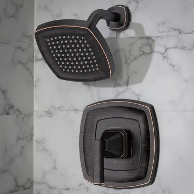 Click here to see American Standard TU612507.278 American Standard Crawford Shower Trim with Water-Saving Showerhead, WaterSense, 1.8 GPM, Legacy Bronze - TU612507.278