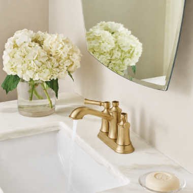 Click here to see Moen 6802BZG Moen Dartmoor Two-Handle Centerset Bathroom Faucet with Metal Pop-Up Drain, 1.2 GPM, Bronzed Gold - 6802BZG