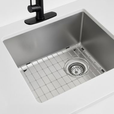 Click here to see Moen GSA52B Moen 15” 18 Gauge Stainless Steel Sink Grid, Rear Drain, Chrome - GSA52B
