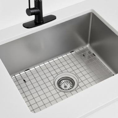 Click here to see Moen GSA51 Moen 19” 18 Gauge Stainless Steel Sink Grid, Rear Drain, Chrome - GSA51