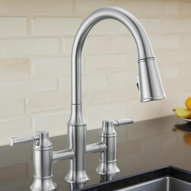 Click here to see Delta 2384L-AR-PR-DST Delta Renaldi Two Handle Pull-Down Bridge Kitchen Faucet, 1.8 GPM, Lumicoat Arctic Stainless - 2384L-AR-PR-DST