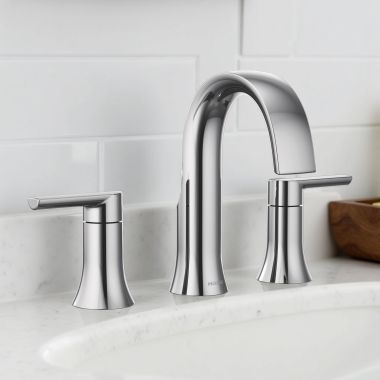 Click here to see Moen TVS6925 Moen Doux Two-Handle Widespread Bathroom Faucet with Valve and Pop-Up Drain, Lever Handle, 1.2 GPM, Duralock, Chrome - TVS6925