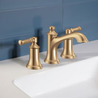 Click here to see Moen TV6805BZG Moen Dartmoor Two-Handle Widespread Bathroom Faucet with Valve and Pop-Up Drain, Lever Handles, 1.2 GPM, Bronzed Gold - TV6805BZG