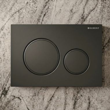 Click here to see Geberit 115.882.16.1 Geberit Sigma20 Dual-Flush Round Actuator Plate For Concealed Tanks, Glossy Black Accent, Matte Black - 115.882.16.1
