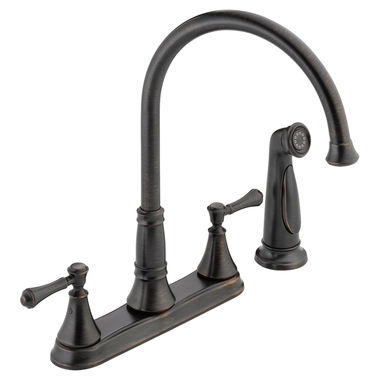 Click here to see Delta 2497LF-RB Delta Cassidy Two-Handle High-Arc Deck-Mount Venetian Bronze Kitchen Faucet with Side Spray, 1.8 GPM, Lever Handle, ADA, No-Lead Compliant - 2497LF-RB