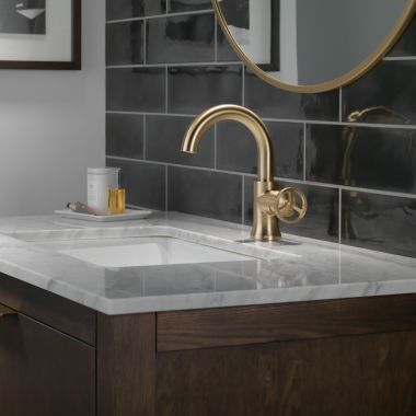 Click here to see Delta 558HAR-CZ-DST Delta Trinsic Single-Handle Bathroom Faucet w/ Pop-Up, Rigid Spout, 1.2 GPM, Champagne Bronze - 558HAR-CZ-DST